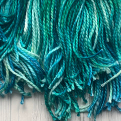 yarn used for rug hooking in the color of sea glass